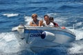 Men on a motor boat in the sea, Turkey Royalty Free Stock Photo