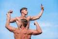Men muscular chest naked torso stand sky background. Strong muscles emphasize masculinity sexuality. Bodybuilder shape Royalty Free Stock Photo