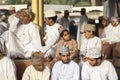 Men in Nizwa goat market