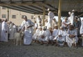 Men in Nizwa goat market