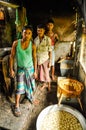 Men with peeled potatoes in Bangladesh