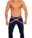 Men with perfect abs measuring his waist Royalty Free Stock Photo