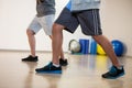 Men performing stretching exercise Royalty Free Stock Photo