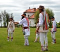 Men performing traditional romanian Calusari dance