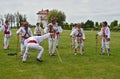 Men performing traditional romanian Calusari dance