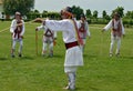 Men performing traditional romanian Calusari dance