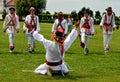 Men performing traditional romanian Calusari dance