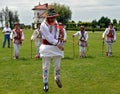 Men performing traditional romanian Calusari dance