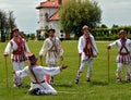 Men performing traditional romanian Calusari dance