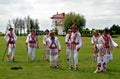 Men performing traditional romanian Calusari dance