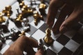 Men play chess game strategy of king on chessboard Royalty Free Stock Photo