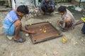 Men playing a board game Royalty Free Stock Photo