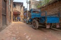 Men playing cards and old blue truck Royalty Free Stock Photo