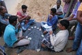 Men playing cards in a village in Kumrokhali, West Bengal, India