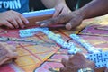 Men playing domino outside on the street of Trinidad Royalty Free Stock Photo