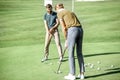 Men playing golf outdoors Royalty Free Stock Photo