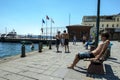 Men playing and swimming in the Bosphorus at Ortakoy in Istanbul on a hot summer day. Royalty Free Stock Photo