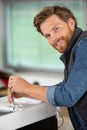 men during precision work on production line Royalty Free Stock Photo