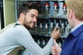 Men during precision work on production line Royalty Free Stock Photo