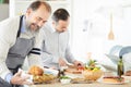 Men preparing dinner together