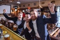 Men at the pub Royalty Free Stock Photo