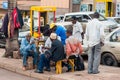 Men relaxing on Entebbe Road, Kampala