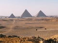 Men Riding Horses with Giza Pyramids as the Background