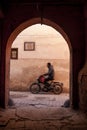 Men riding a motorbike in Marroco Royalty Free Stock Photo