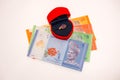 Men ring inside red box with Malaysian currency notes Royalty Free Stock Photo