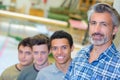 4 men on row Royalty Free Stock Photo