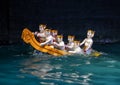 Men rowing a boat water puppets in the Thang Long Water Puppet Theatre, Hanoi, Vietnam Royalty Free Stock Photo