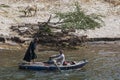 Men rowing down the River Nile near Luxor in Egypt.