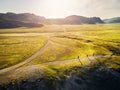 Men running at country road near river aerial landscape Royalty Free Stock Photo