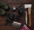 Men`s accessories. Outfit of traveler, student, teenager, young woman or guy. Different objects on wooden background. Royalty Free Stock Photo