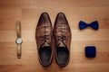 Men`s accessories: watch, tie, belt, cufflinks, perfume shoes top view