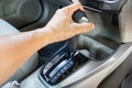 Men`s arm hold control auto gear for car shifting into P Royalty Free Stock Photo