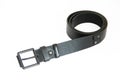 Men`s black leather belt for trousers on a white background Royalty Free Stock Photo