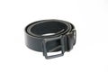 Men`s black leather belt for trousers on a white background Royalty Free Stock Photo