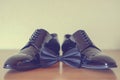 The men's black shoes and bowtie