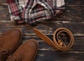 Men`s brown clothing and accessories set: boots, leather belt