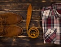 Men`s brown clothing and accessories set: boots, leather belt