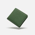 men\'s canvas wallet in forest green on solid white background Royalty Free Stock Photo