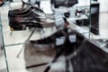 Men`s clothing store. Men`s black leather derby shoes on a store shelf. Royalty Free Stock Photo