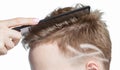 Men`s creative haircut in the beauty salon. Hair care and hair styling