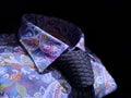 Men`s dark-sleeved floral shirt with blue knit tie