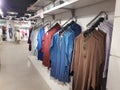 Men`s ethnic dress display in fashion retail shop