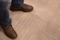 Men's feet in casual walking shoes Royalty Free Stock Photo