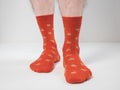 Men`s feet in funny, colorful socks Royalty Free Stock Photo