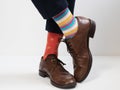 Men`s feet in stylish shoes and funny socks Royalty Free Stock Photo