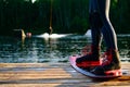 men s feet on a wakeboard Royalty Free Stock Photo